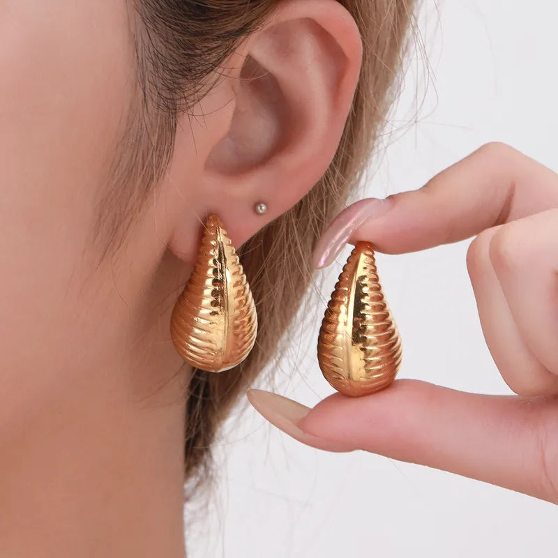 Hailey in Spiral Drop Earrings